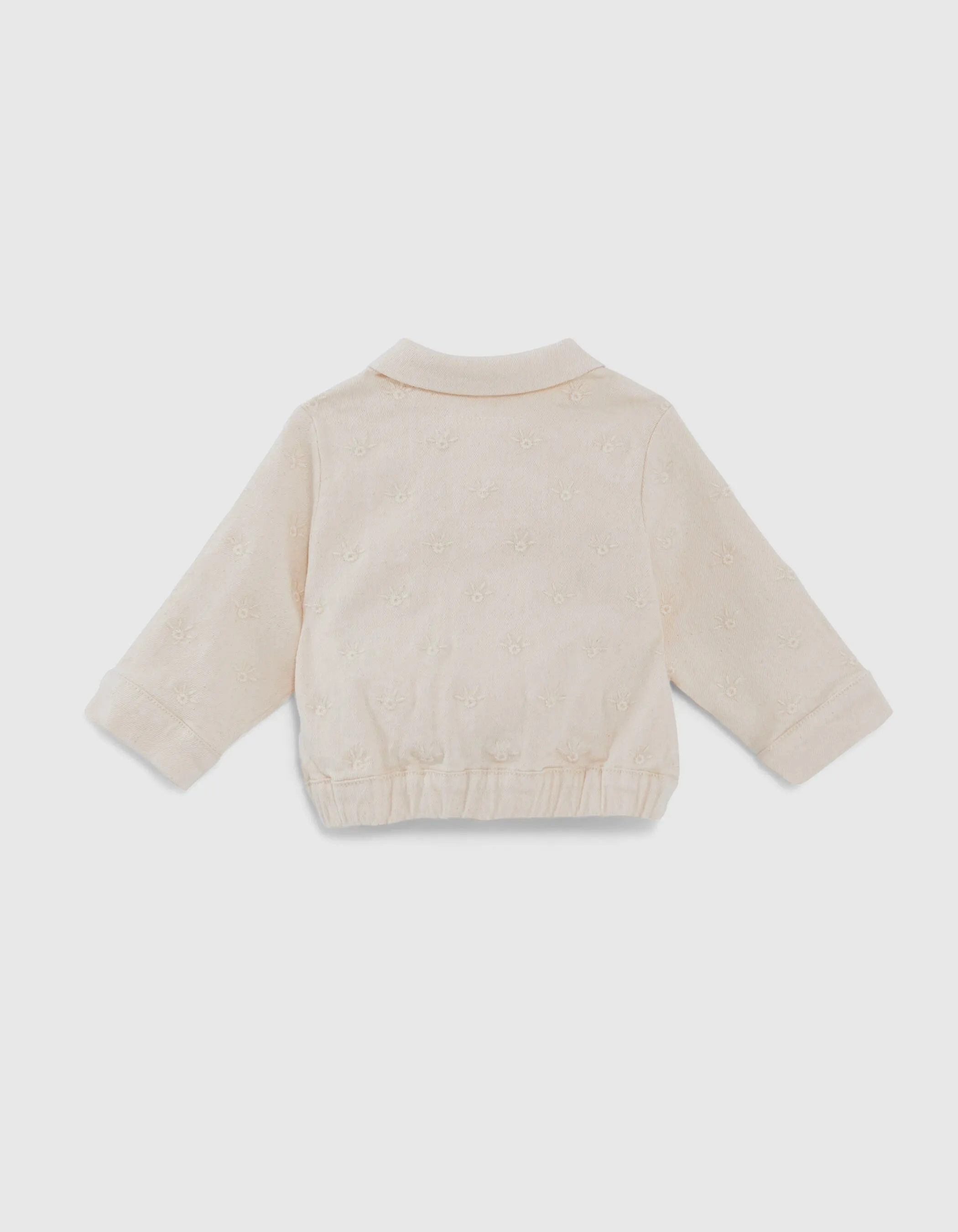 Baby girl's off-white denim jacket with tone-on-tone embroidery.