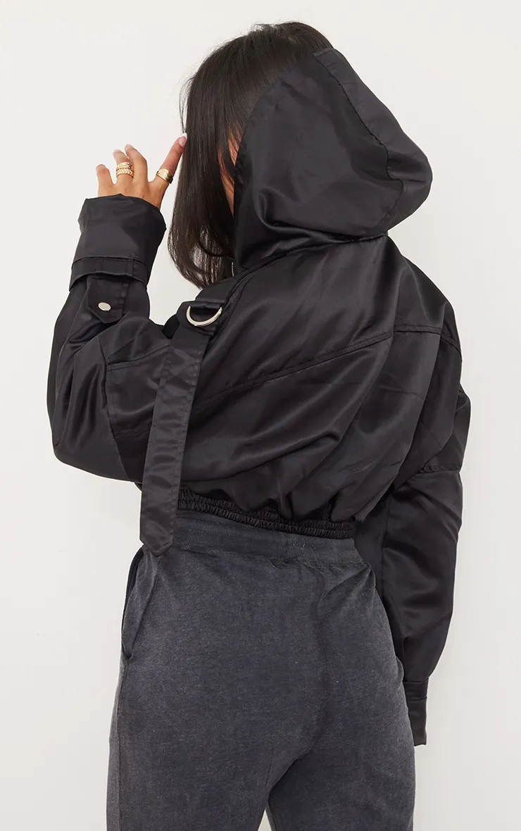 Bomber satiné oversize noir à capuche et poches