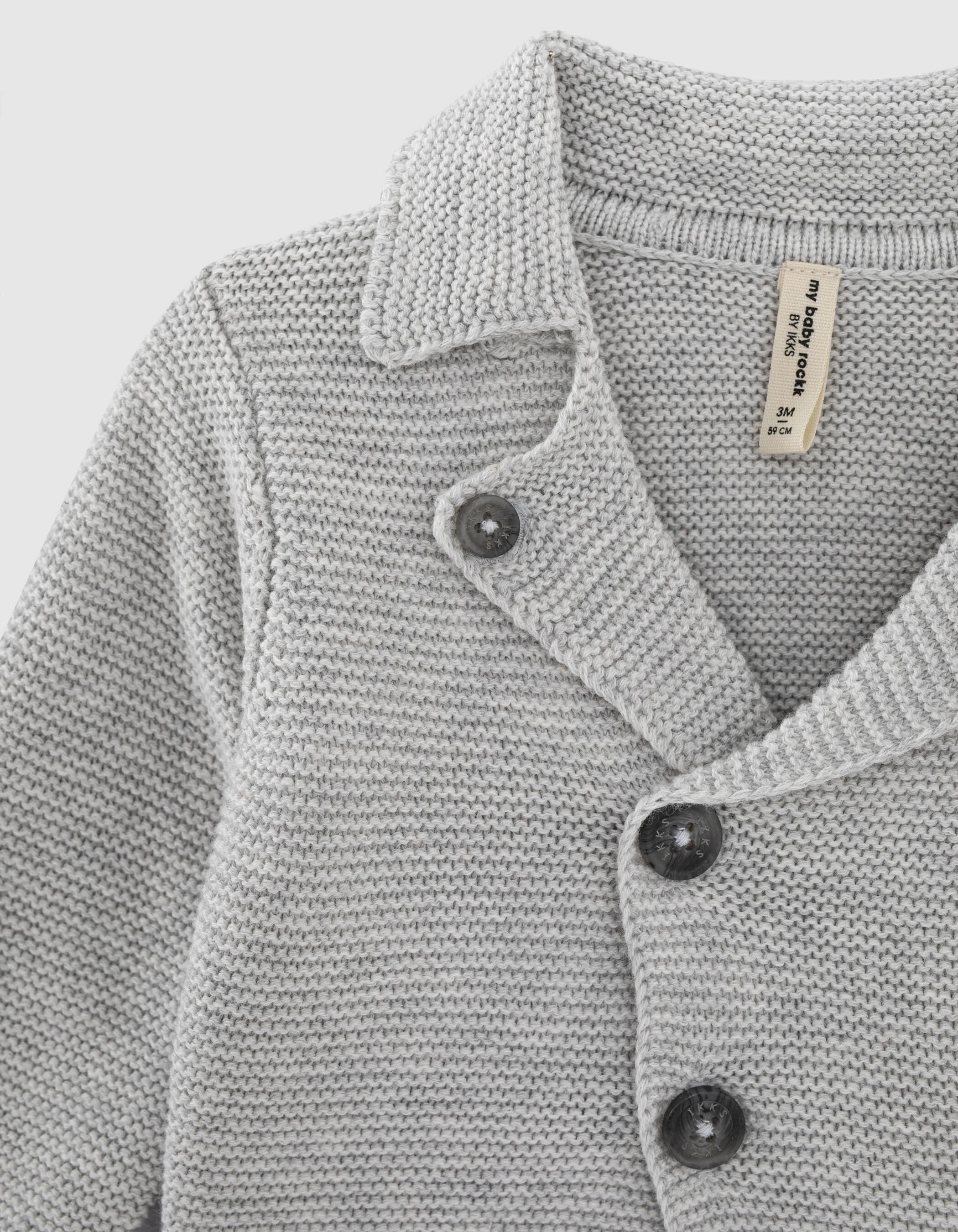 Organic cotton knit cardigan with motorcycle-inspired style for babies.